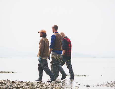 three-fishermen-walking-beach.jpg three-fishermen-walking-beach.jpg